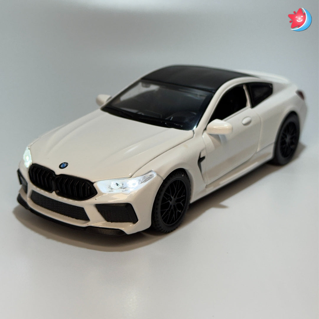 BMW M8 Beige model car on a gray background