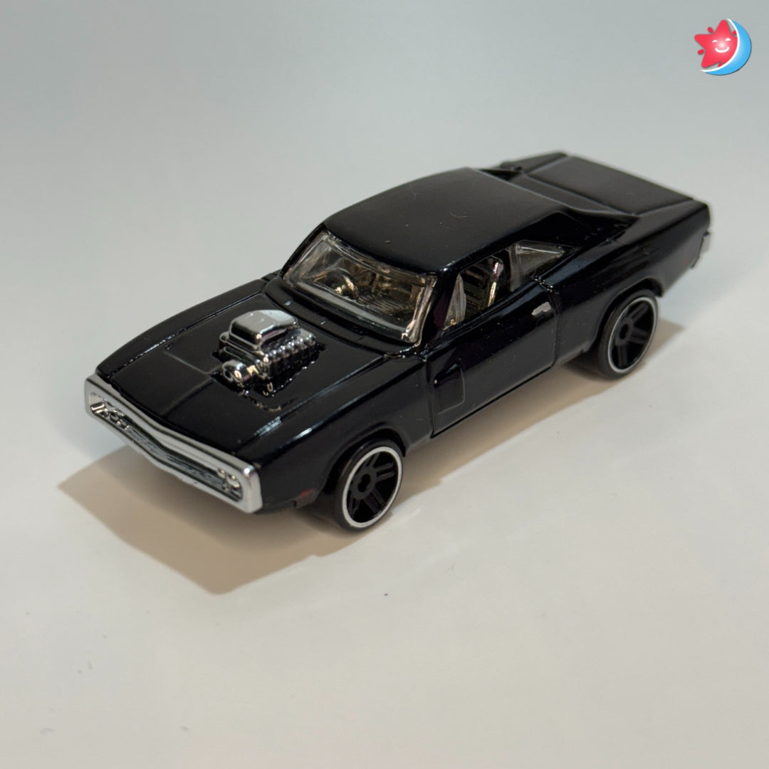 Black model car on a light gray background