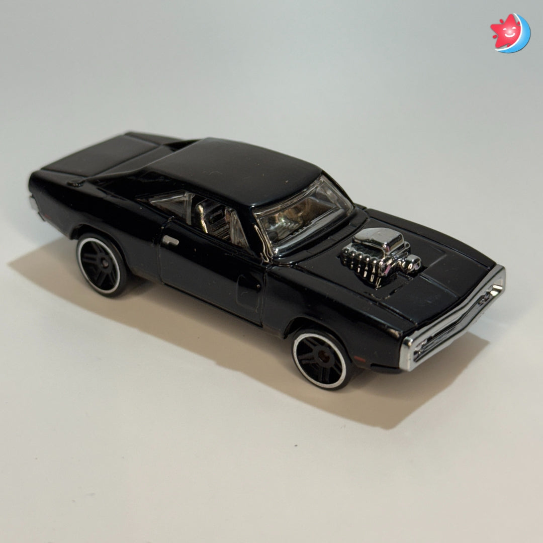 Black model car on a light gray background