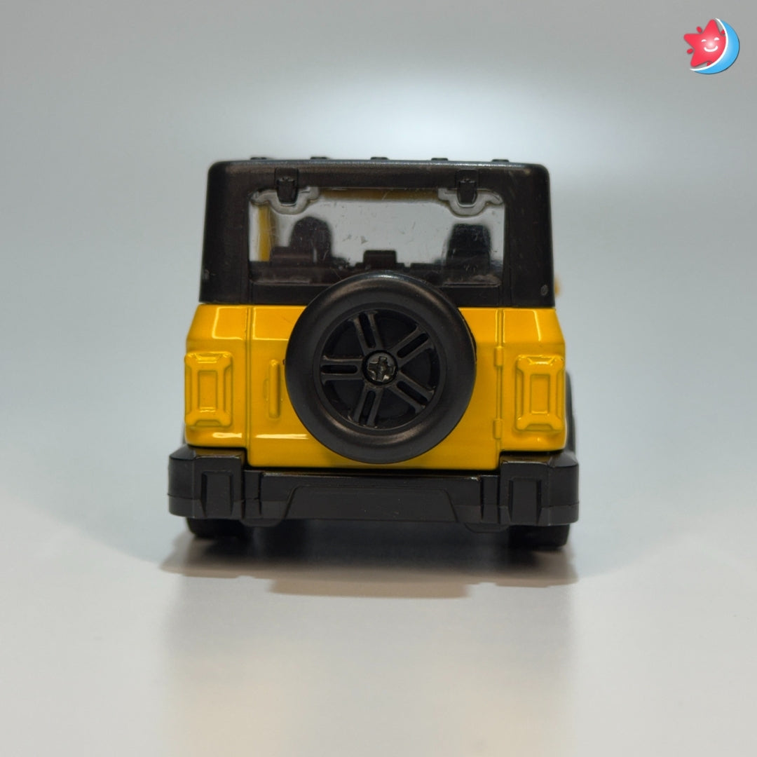 Yellow and black toy vehicle on a white background