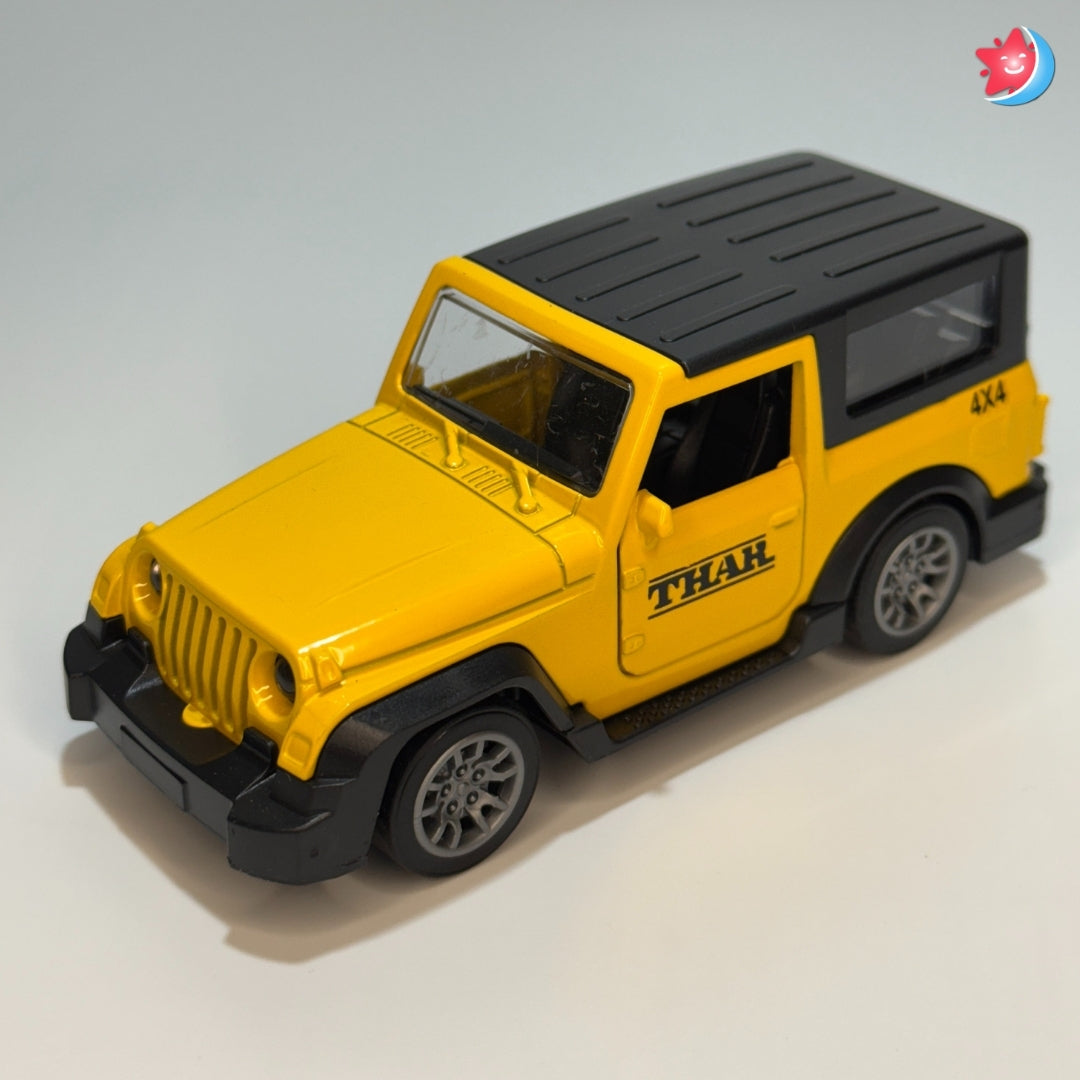 Yellow toy jeep with black roof on a light gray background