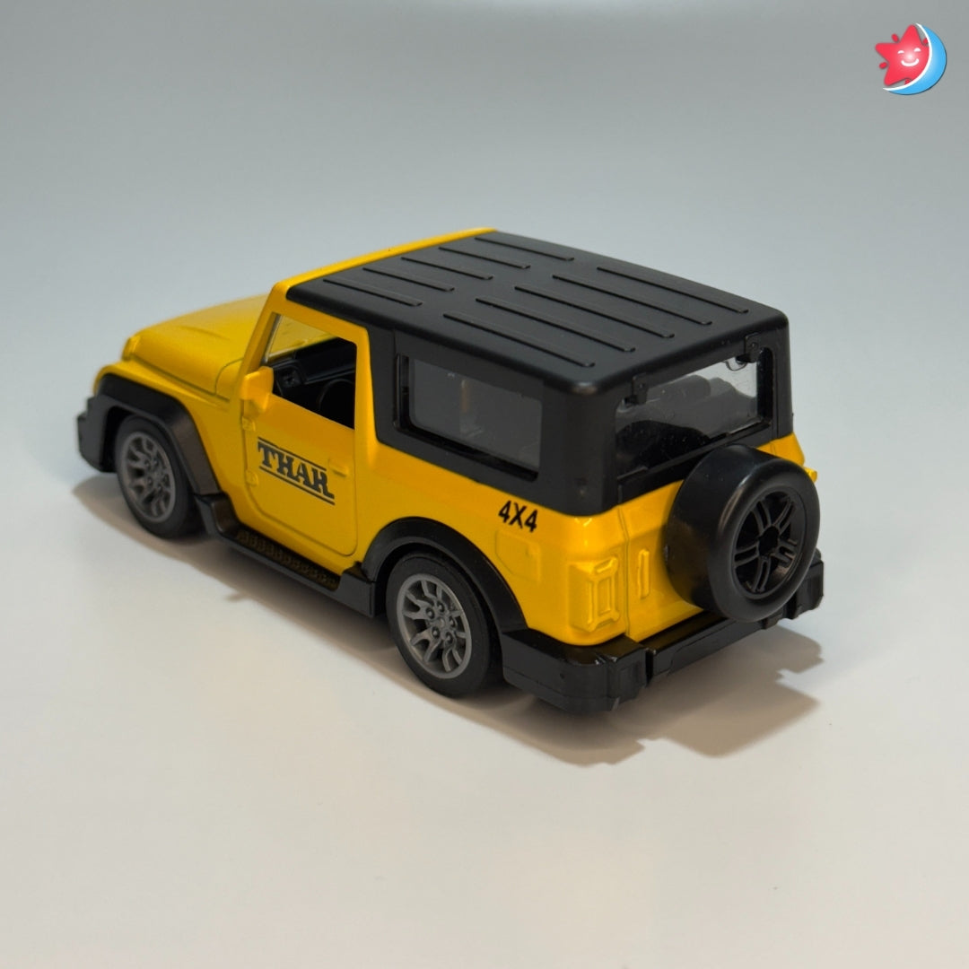 Yellow toy jeep with black roof on a light gray background